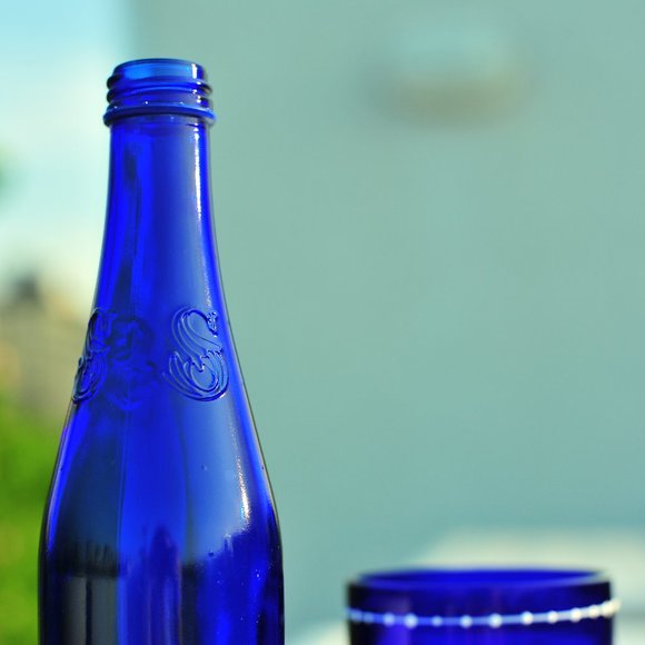 Exquisite Cobalt Blue Water Glass Bottle with Floral 3D Artwork - Picture 10 of 14